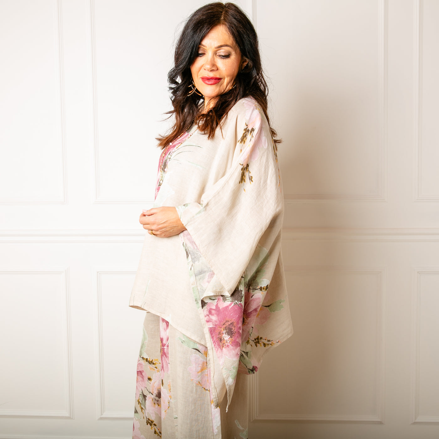 The stone cream Bouquet Print Linen Top with relaxed drop sleeves for an elegant floaty look